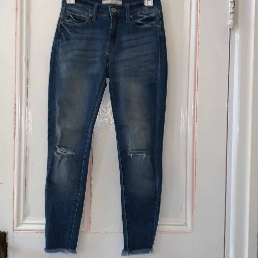 Dark blue ripped jeans
